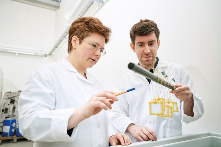 Dr. Sviatlana Lamaka and Bahram Vaghefinazari at work